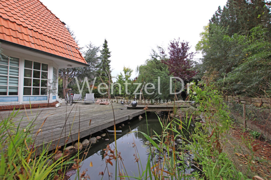 Hochwertige Erdgeschosswohnung mit Terrasse und Platzreserve im Keller - Nahe dem Hemmelsdorfer See - Startbild